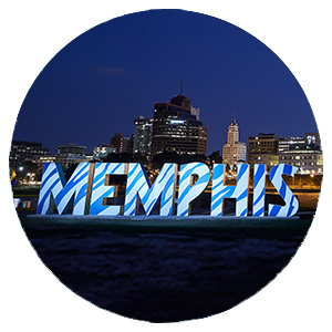 Memphis letters in front of city skyline