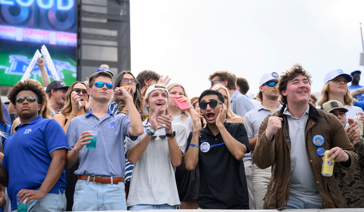 students at homecoming game