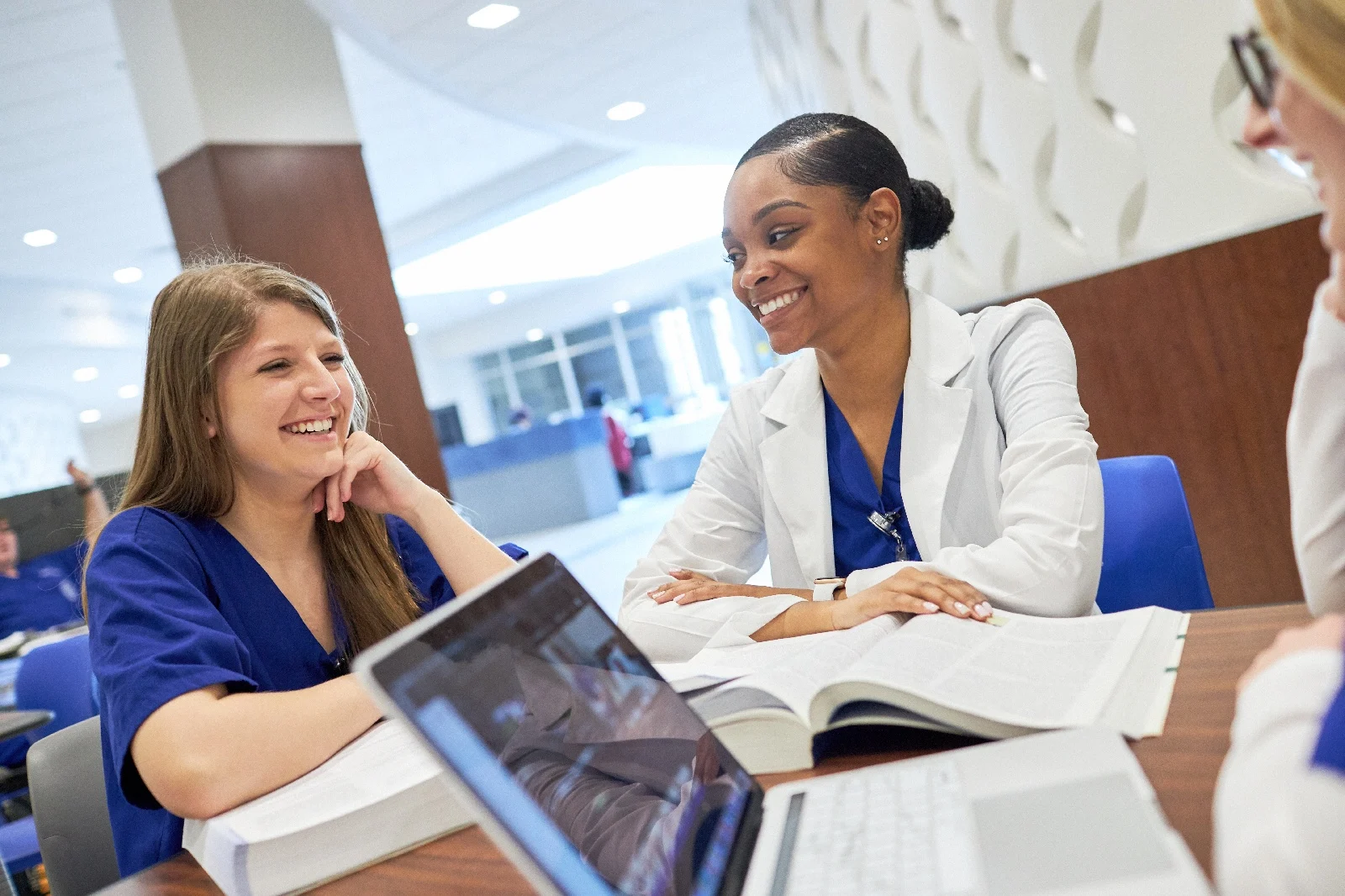 medical assistant student working together in classroom