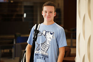 student with backpack