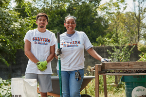 students volunteering in garden for Service on Saturday