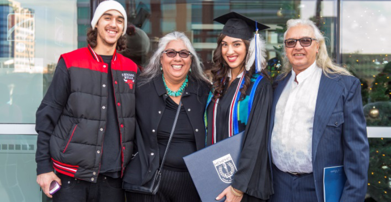 Recent graduate and family