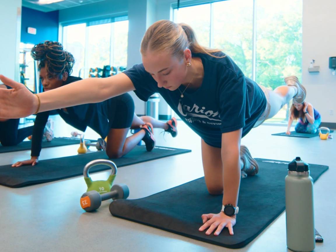 student doing core workout