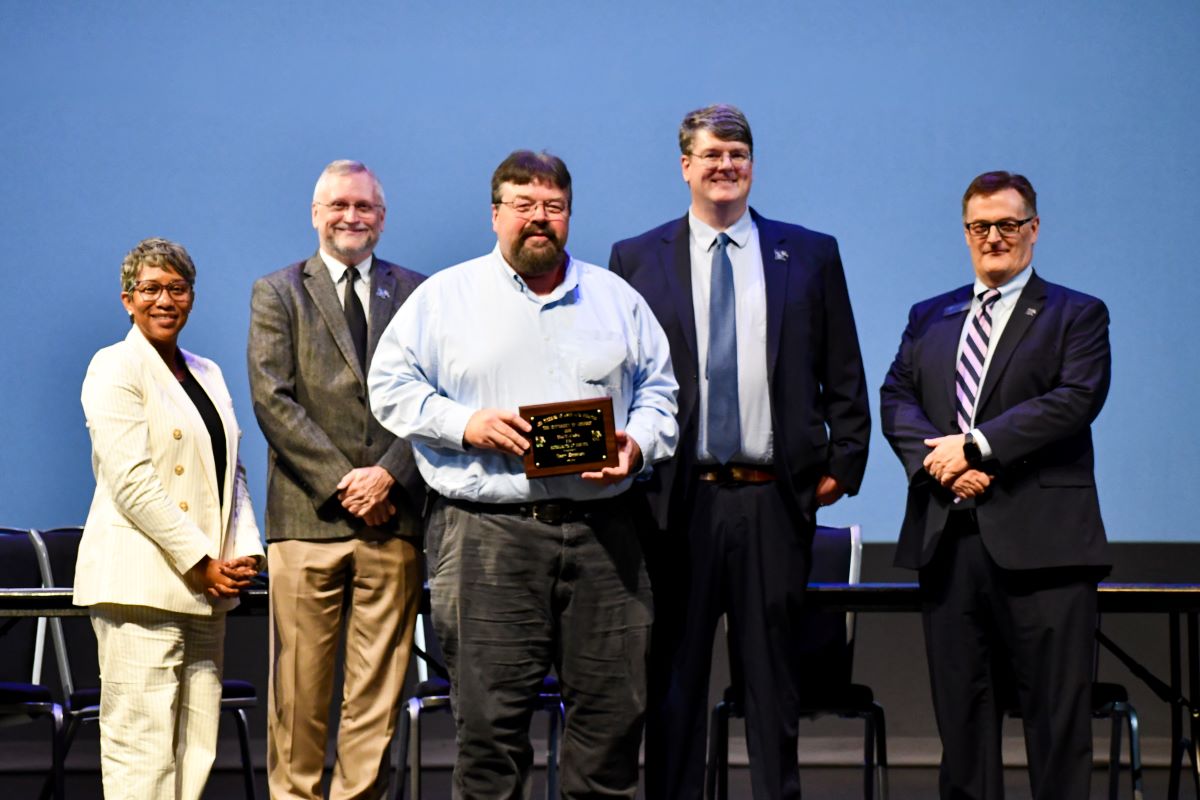 Gary receiving award