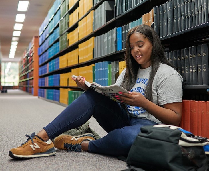 female student reading