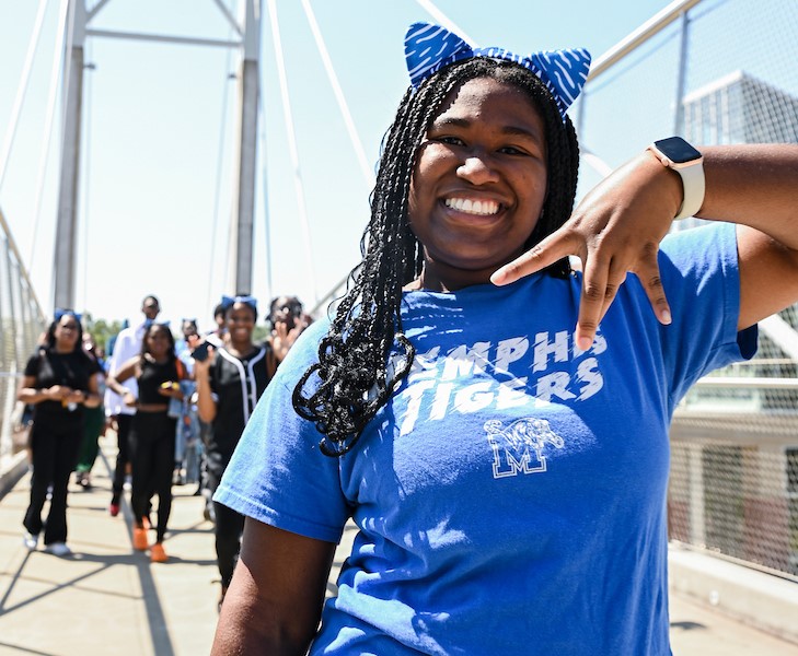 smiling student on sunny day