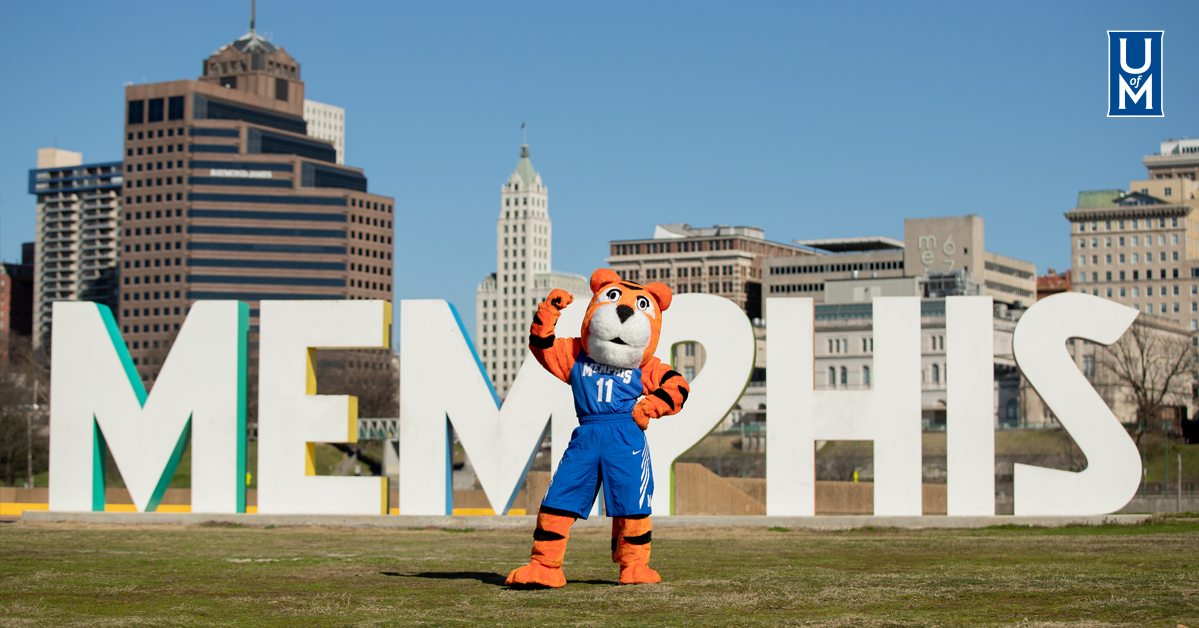 Pouncer in front of Memphis sign