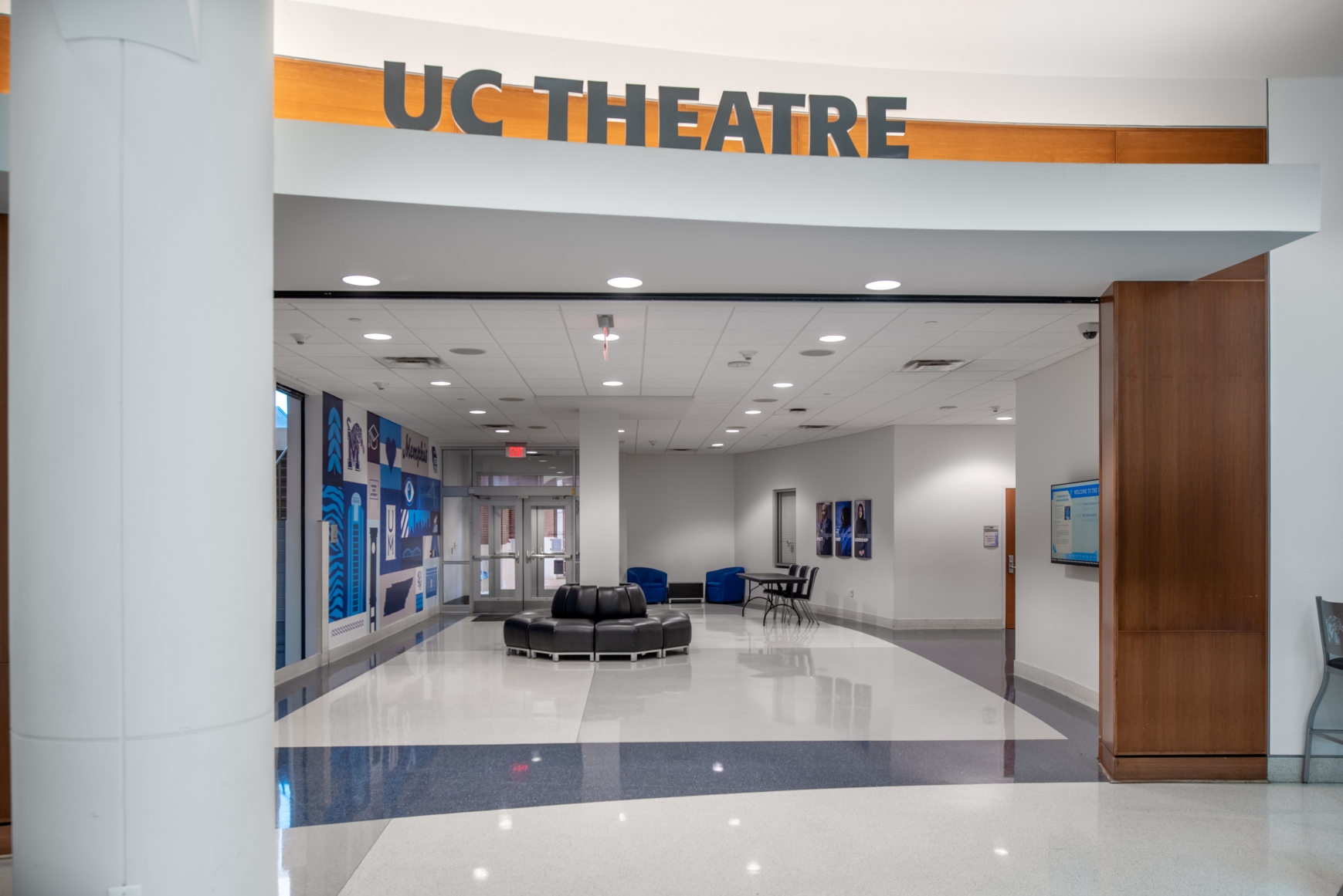 Entry area to UC Theatre showing small seating area and empty lobby