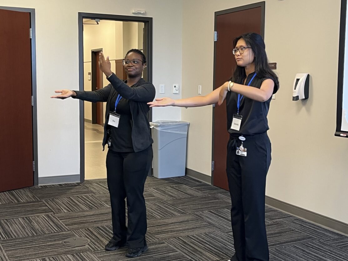 Students leading a warm-up