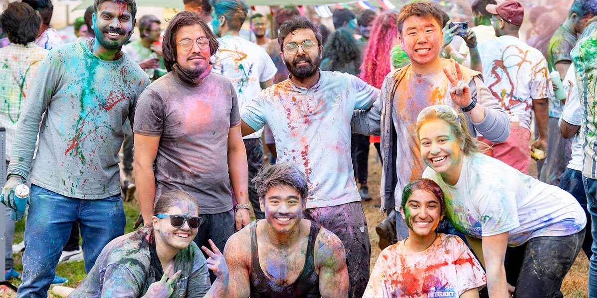 A group of students smiling at camera