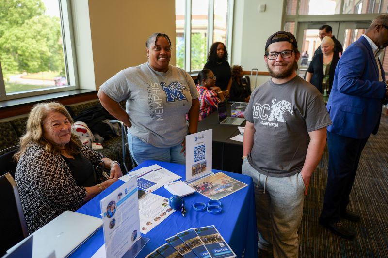 University of Memphis Institute on Disability Director Dr. Chrisann Schiro-Geist speaks with a student during a campus event.