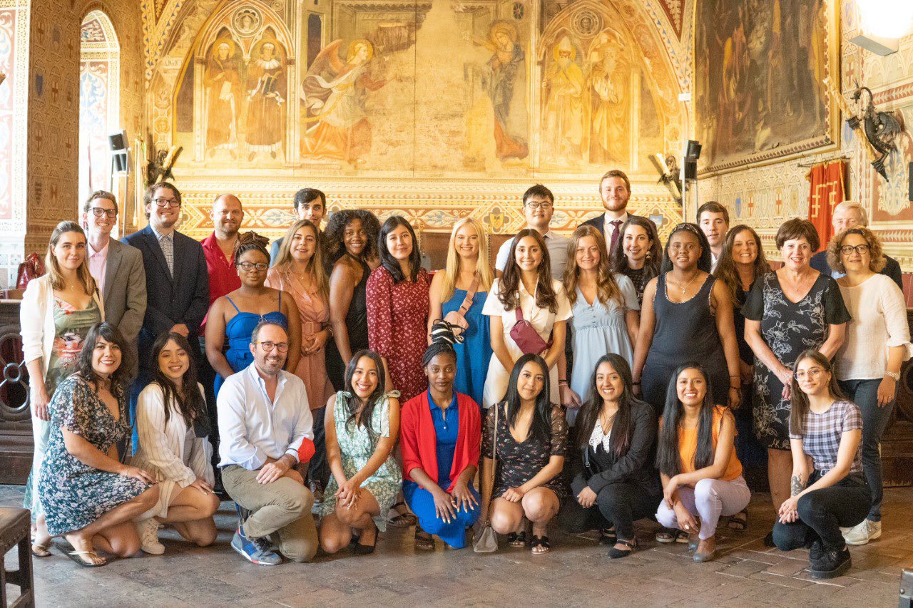 Students and staff visiting the  Volterra, Italy City Hall during their 18-day tour.