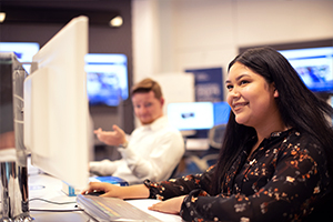 student on desktop computer