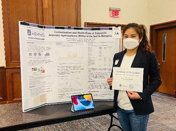 Namuum Batbaatar stands in front of her first place project