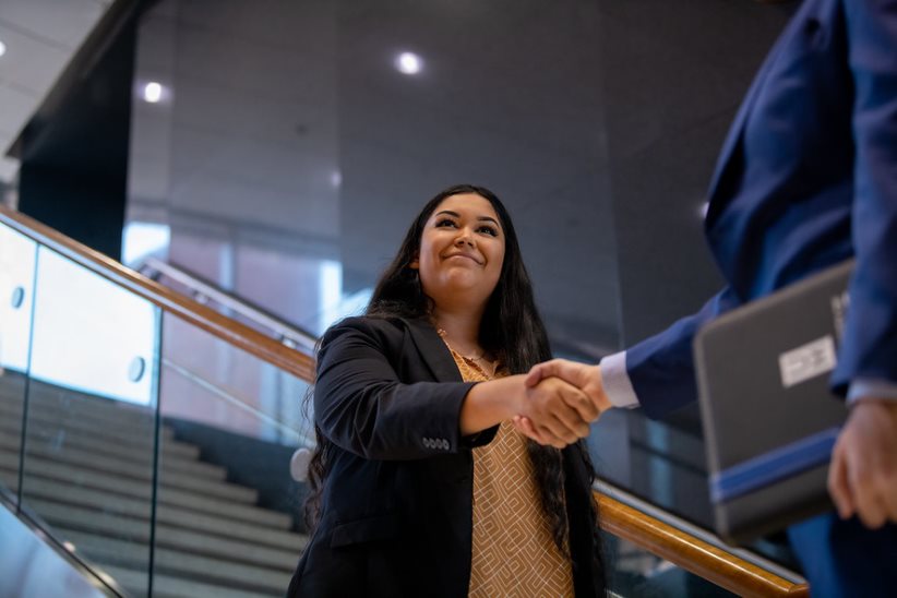 woman shaking hand