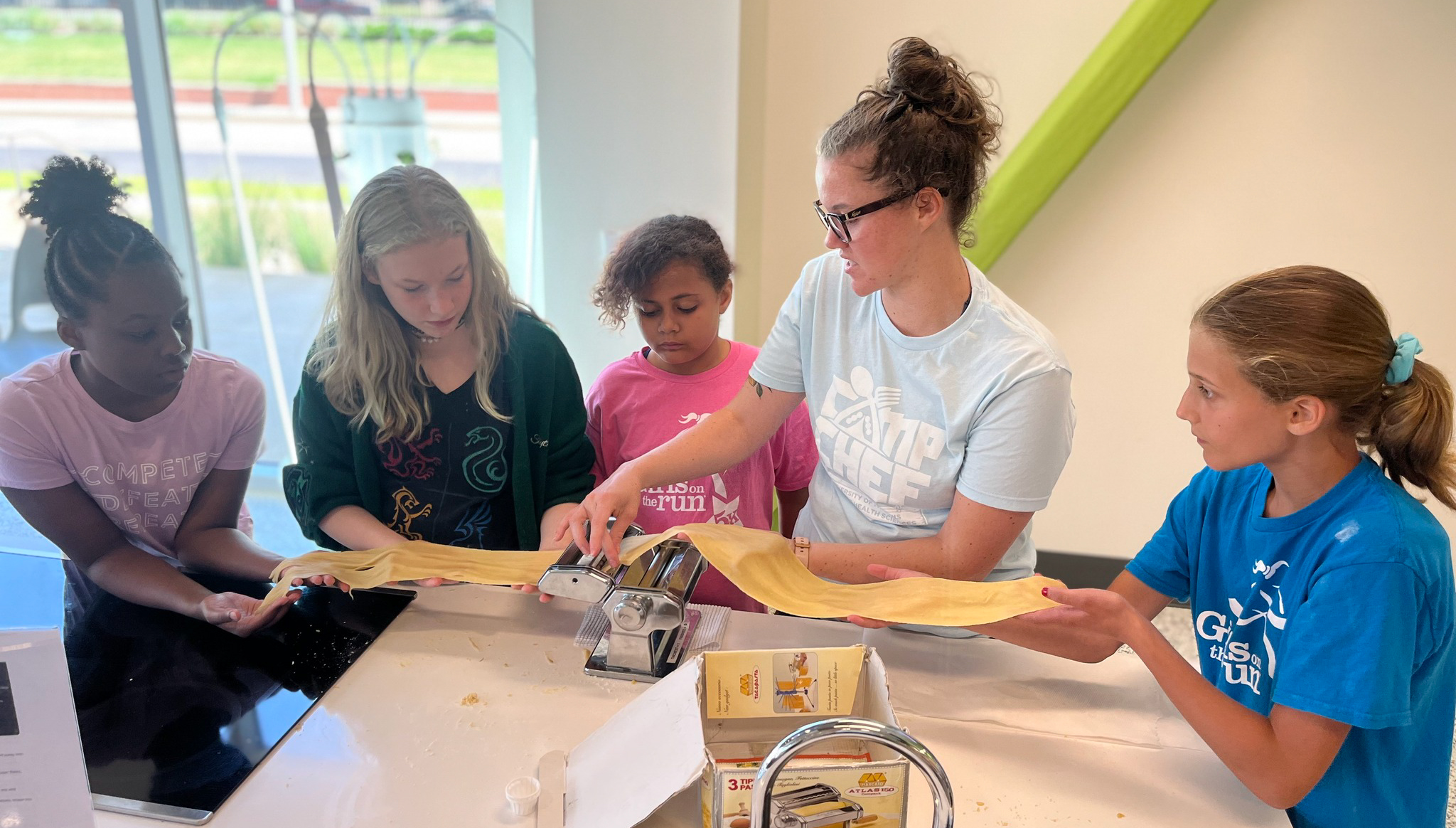 Camp CHEF students making pasta