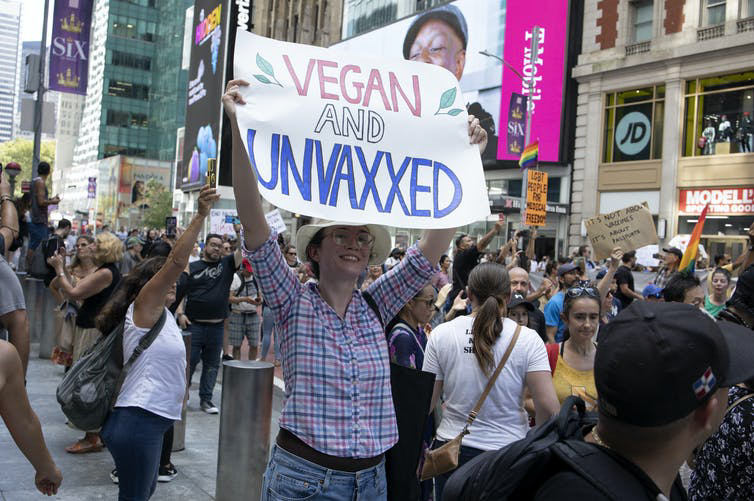 Several thousand protestors opposed to the COVID-19 vaccine march through the streets of midtown Manhattan in New York on Sept. 18, 2021. Andrew Lichtenstein/Corbis News via Getty Images