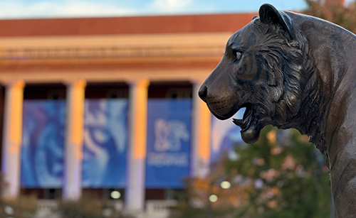 Tiger sculpture in front of University Center Tiger sculpture with administration building in the background