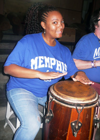Felicia Hankins playing a drum