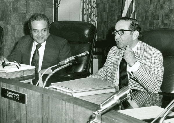 Hooks seated as commissioner. Also picture, commisioner Robert E. Lee.