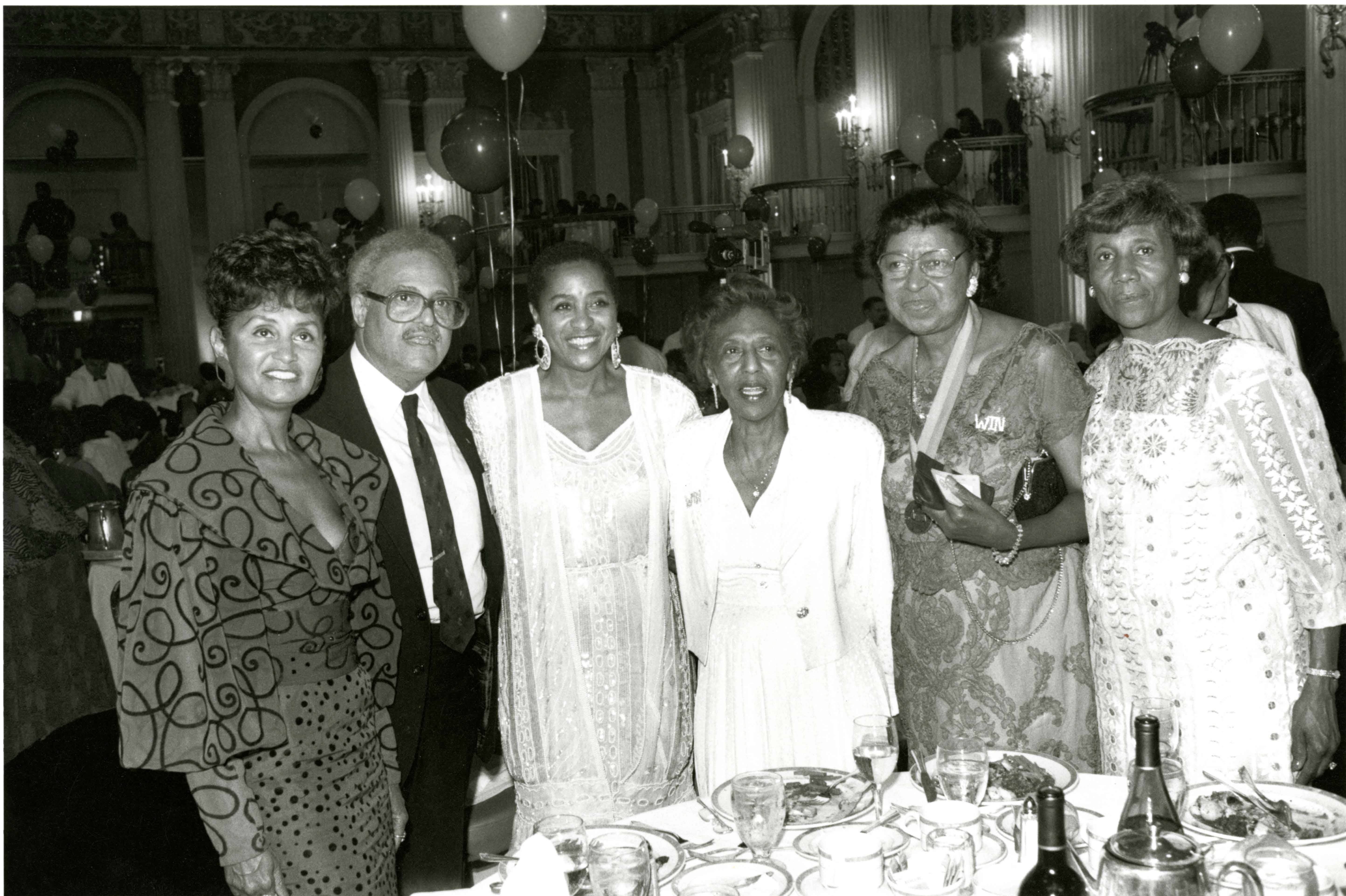 Franes and Benjamin Hooks with WIN members, 1990. 