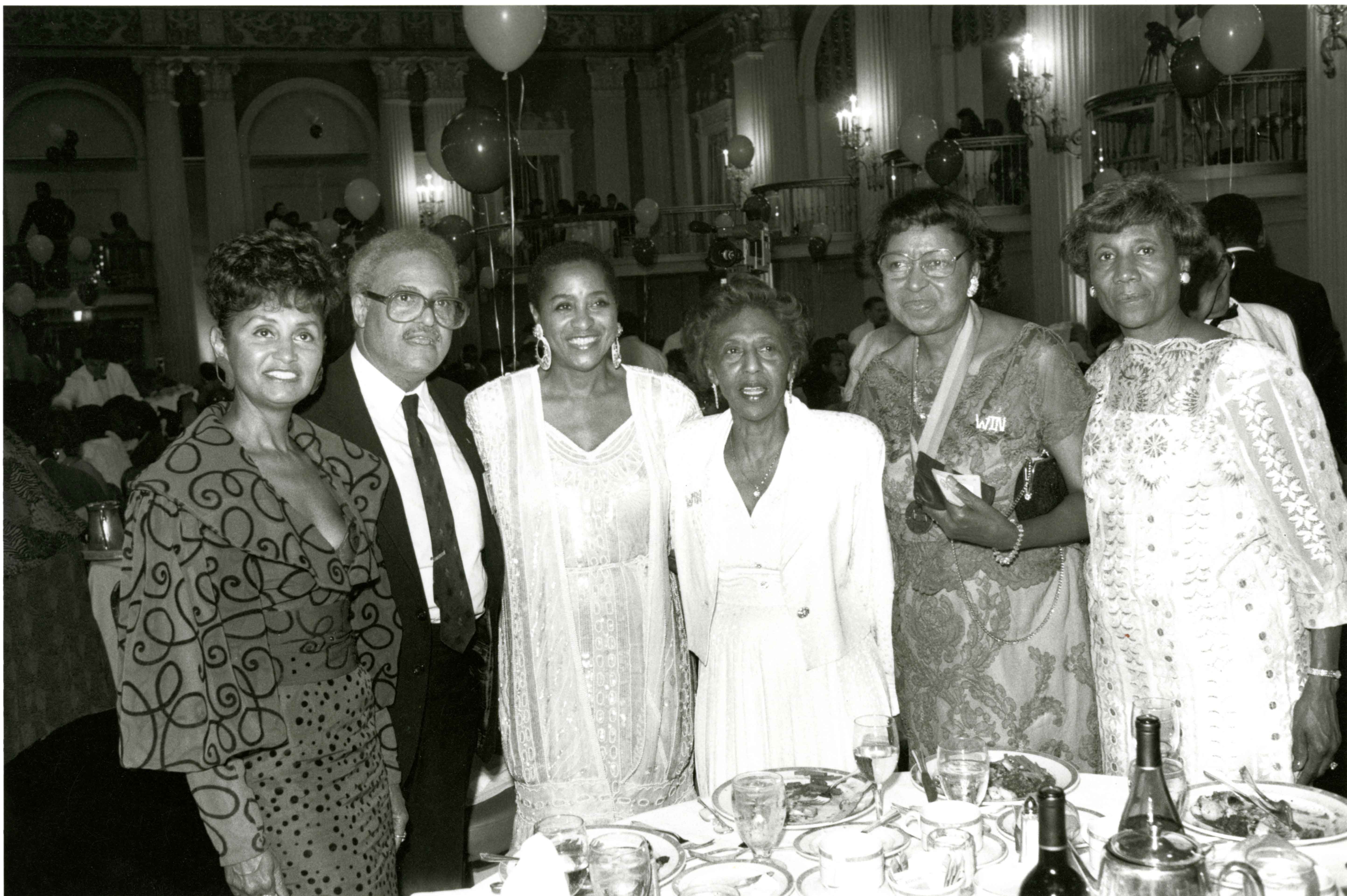 Franes and Benjamin Hooks with WIN members, 1990.