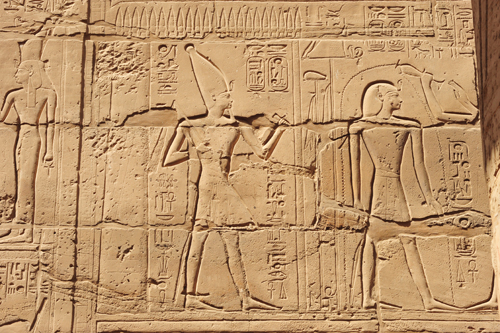 Plate 51 (B95-96) - Ramesses II emerging from the palace (left, B96) and being purified by Khnum (right, B95)