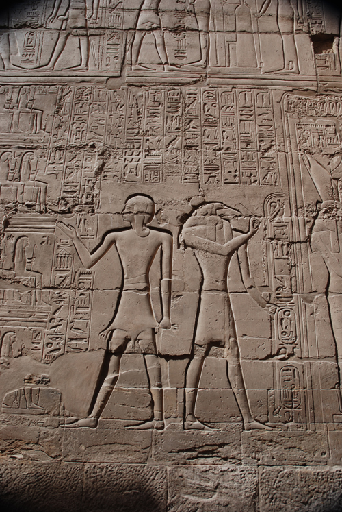 Plate 52 (B97-98) - Ramesses II receiving regalia and jubilees from Amun-Re in the presence of Mut and Khonsu, while Thoth inscribes years of reign (right, B97) and Iunmutef addresses the Great Ennead (left, B98)