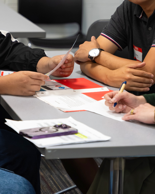 Students doing paperwork