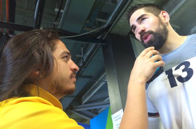 UofM journalism student Jonathan Capriel interviews French handball player Nikola Karabatic during a break as a reporter for the Olympic News Service this past summer in Brazil.