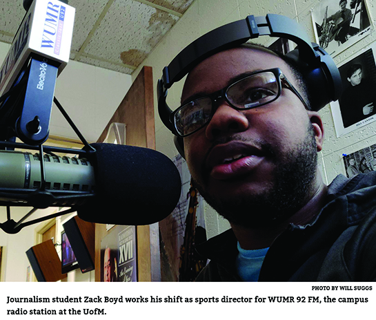 Zack Boyd behind the mic at WUMR