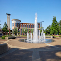 Maxine A Smith University Center exterior with blue fountain