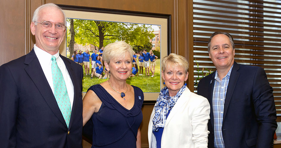 Photo of Mike and Pam Koban (left) surprised Pam's sister, Patti Bradford, by establishing an endowed scholarship in her name