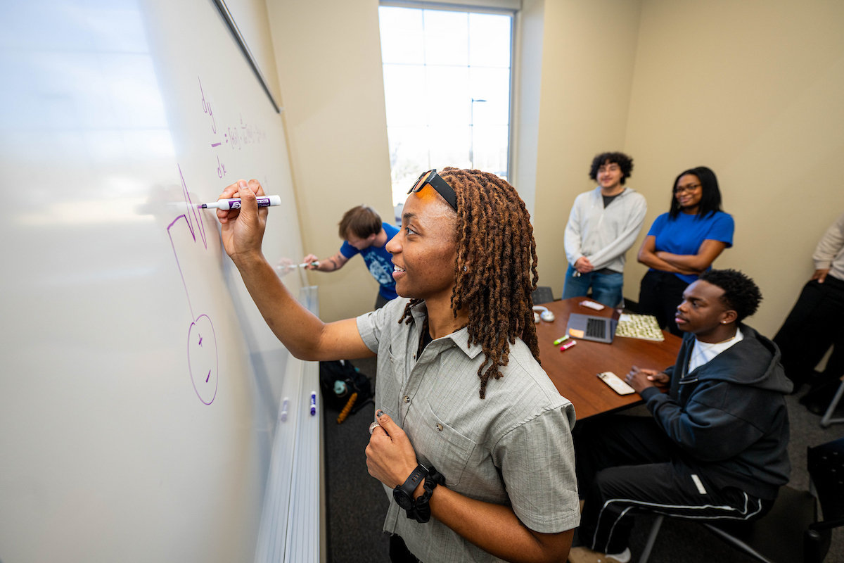 students at whiteboard