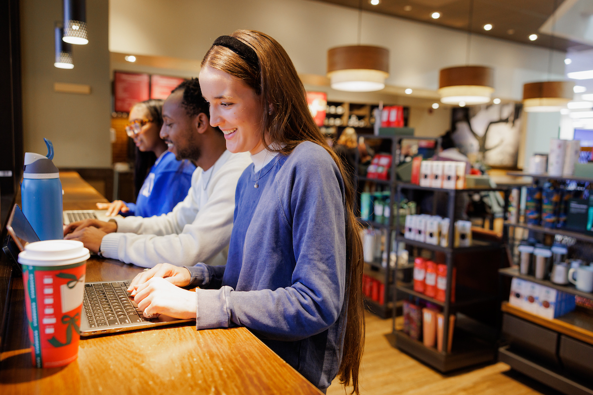 students at laptop