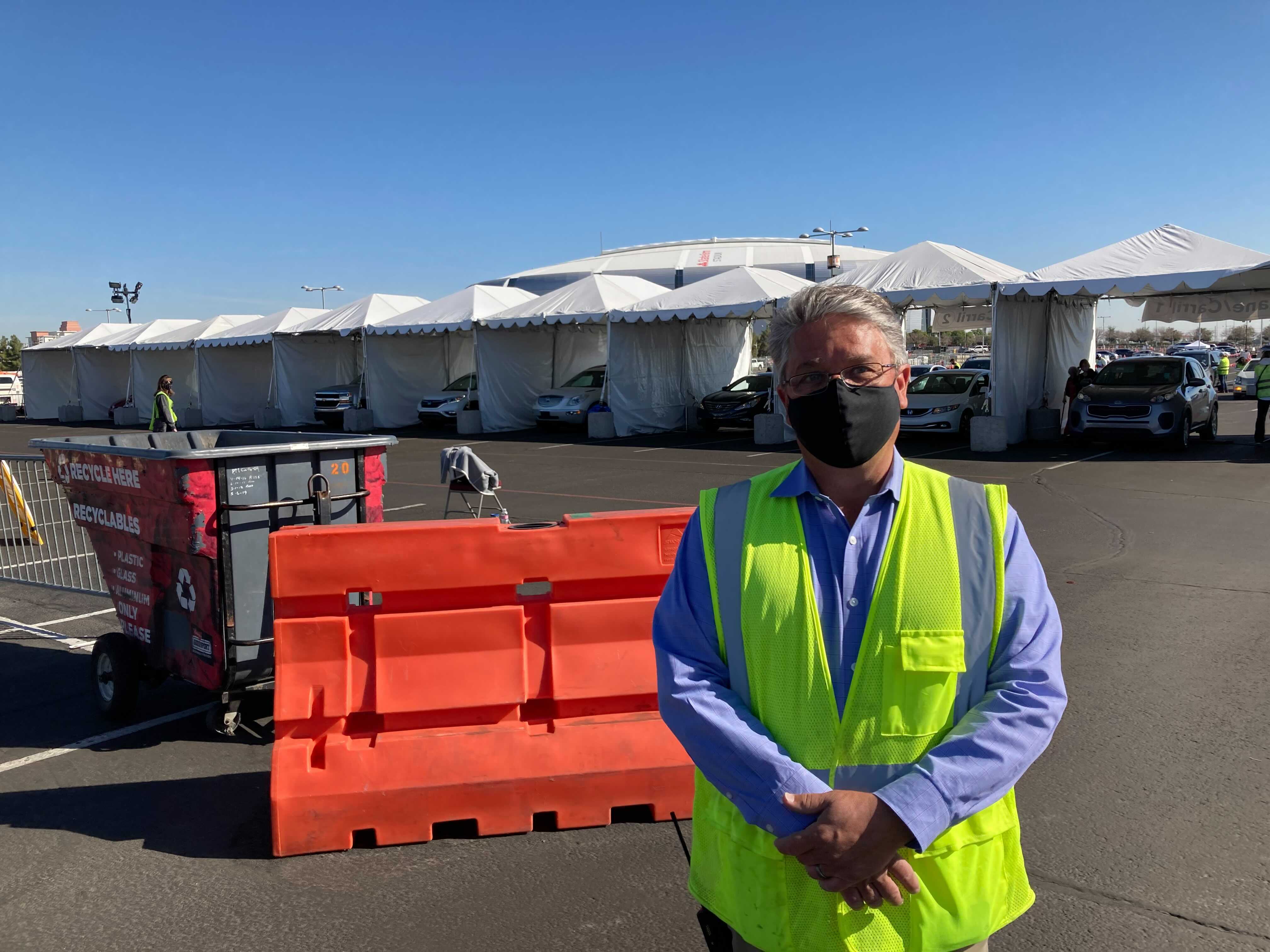 David Thomas outside vaccination site at Cardinal Stadium.