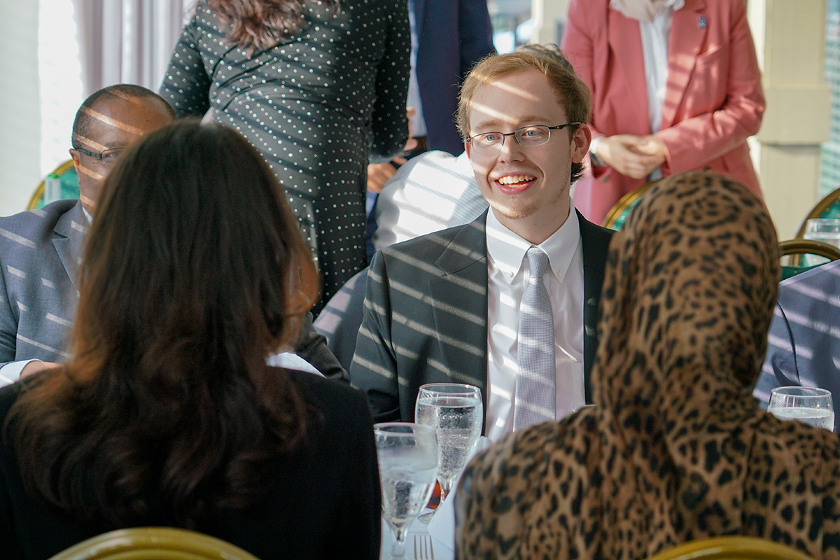William Whitfield speaks to peers during the banquet 