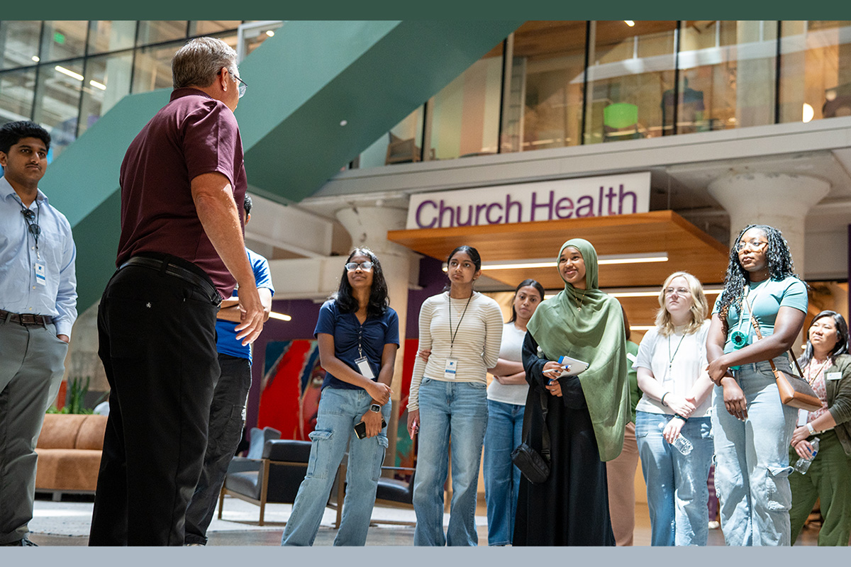 Students tour the Church Health Center with Randy Kostiuk, Community Engagement Director