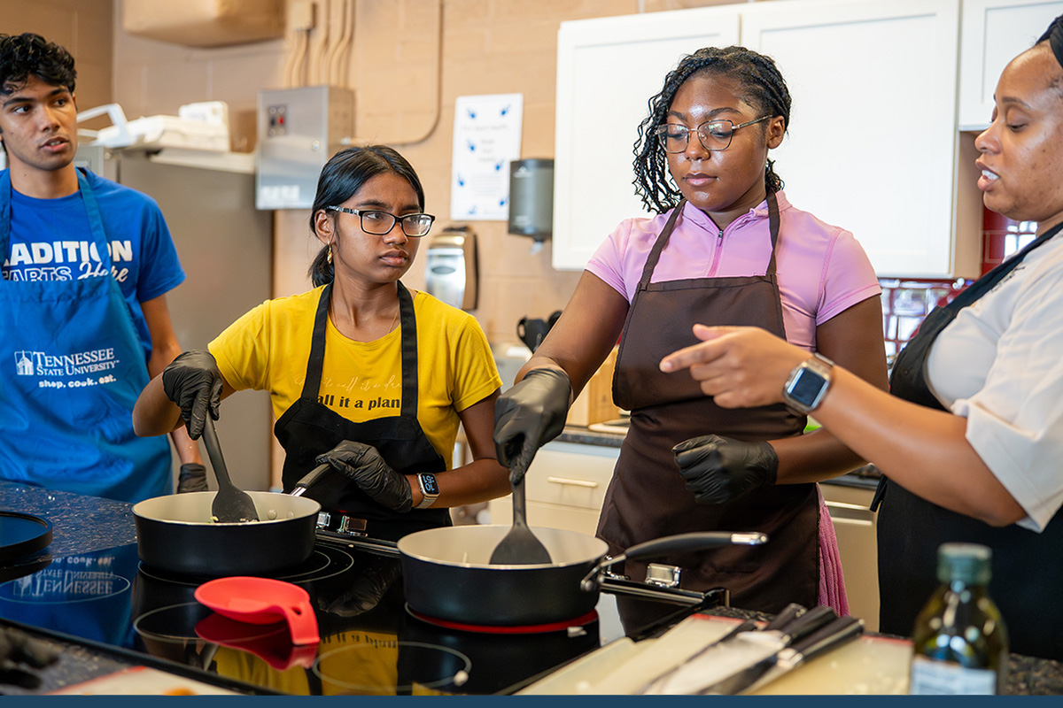 EMPOWER Participants Engage in a Cooking Demonstration Led by Karen Bernard