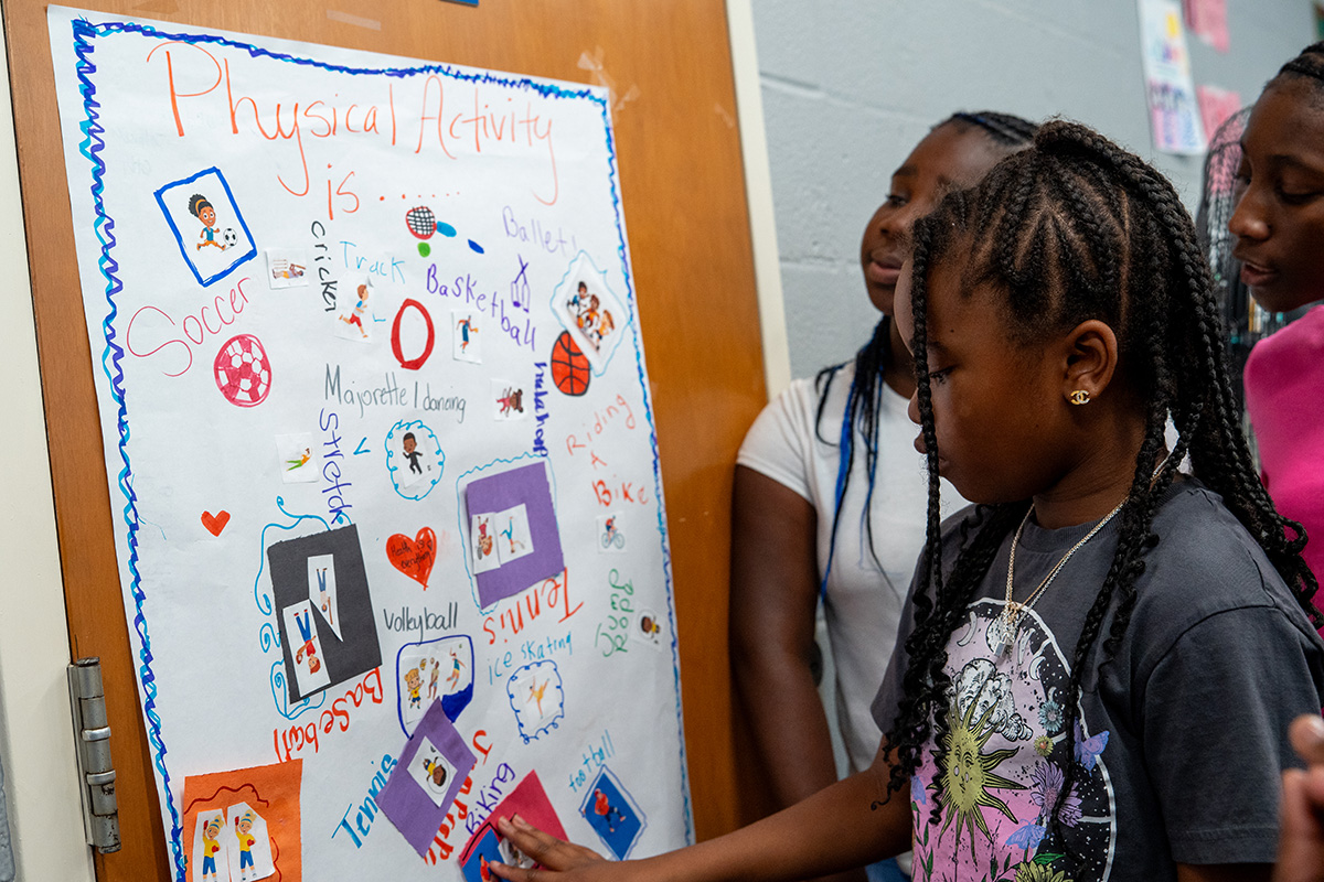 MYA summer campers create poster on the importance of physical activity