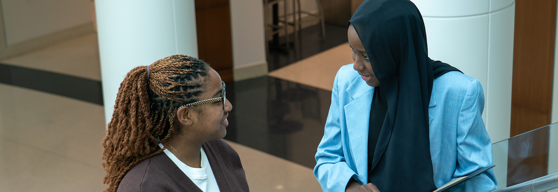 2 female students talking