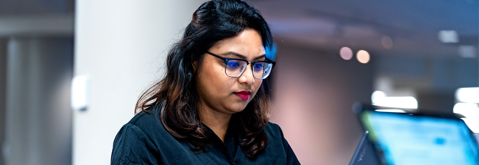 Female Student studying at laptop