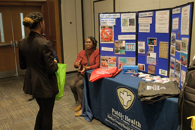 Career and Internship Fair - Fall 2024 - Participant and Student talking