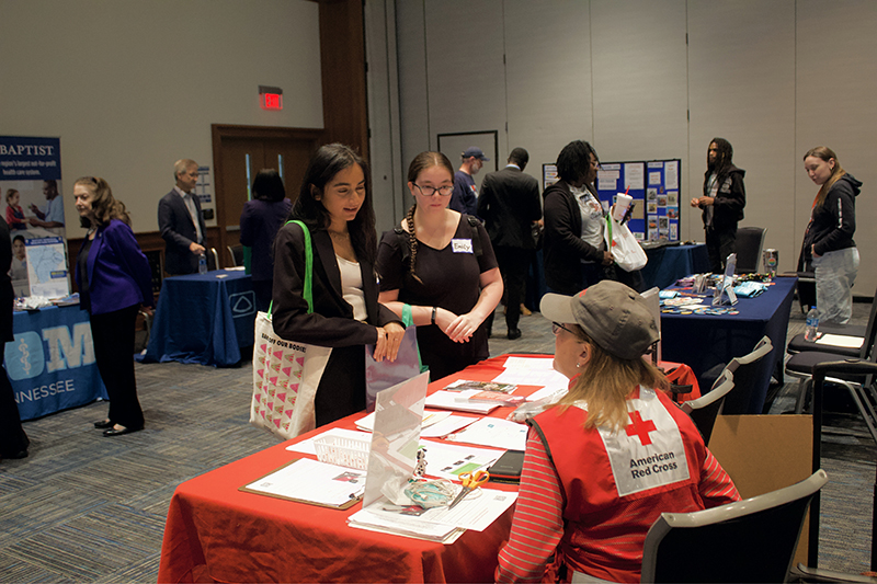Career and Internship Fair - Fall 2024 - Participants and Students talking