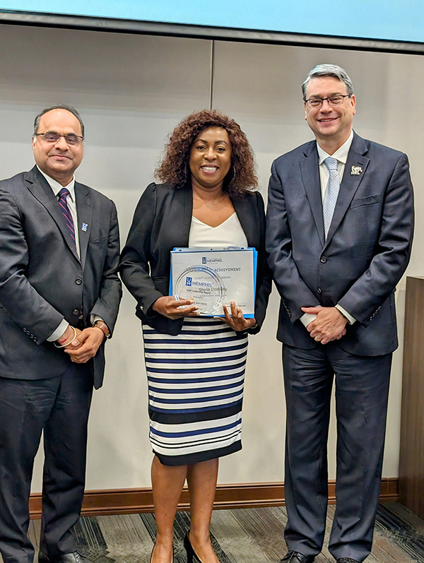 Stella Dockery receiving Award