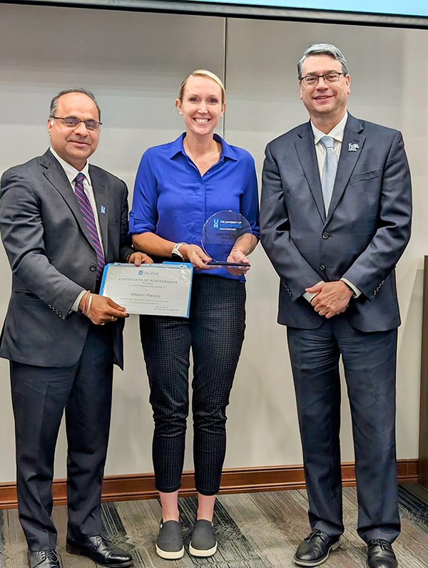 Allison Plaxco receiving Award