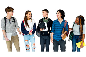 Young students walking and talking in college campus.