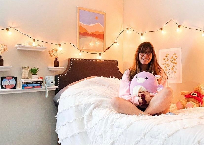 student in room with lights