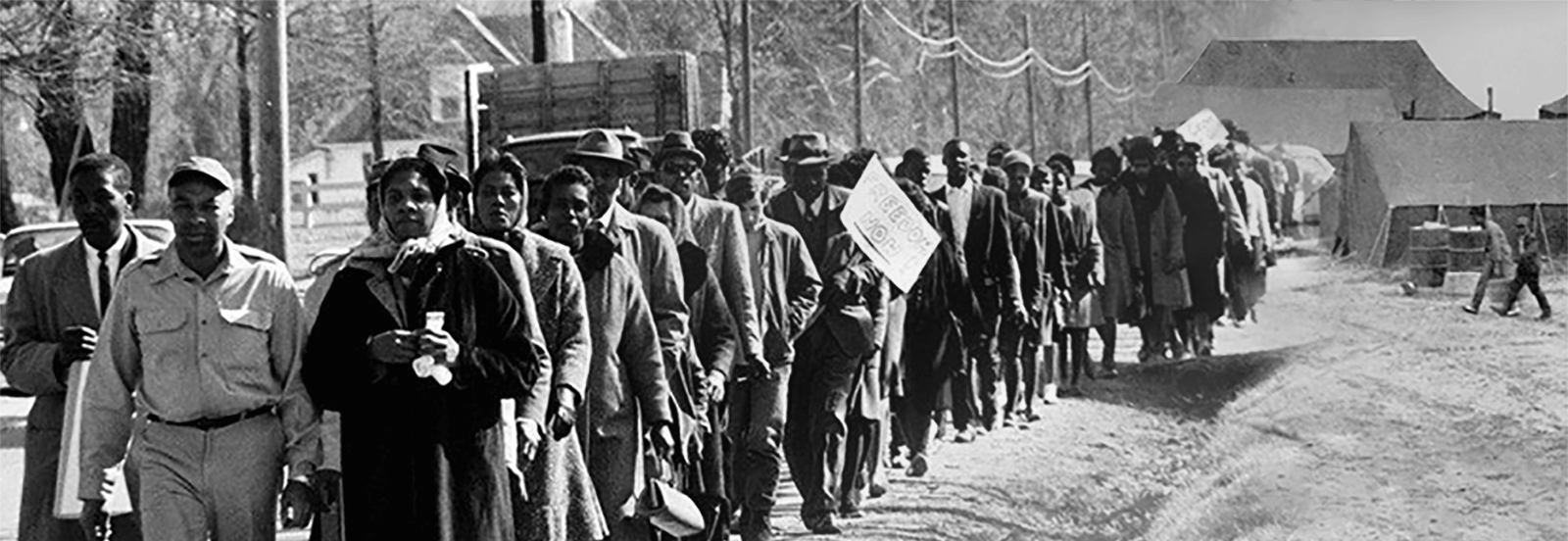 Fayette County Civil Rights Activist Marching. Photo (left) ©Art Shay, John and Viola McFerren leading protestors to the Fayette County, Tennessee Courthouse, March 1965.