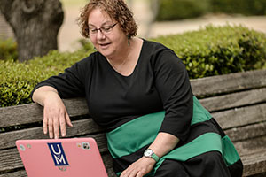 student working on laptop